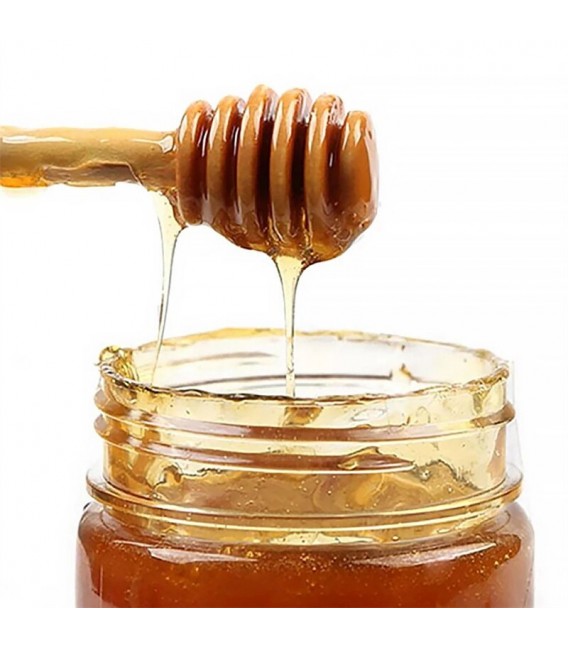 Small wooden honey dipper